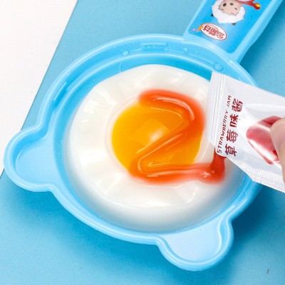 金稻谷82g煎蛋形布町果冻+跳跳糖趣味糖玩儿童零食盒装小糖果批发图2